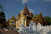 Yangon Myanmar. Shwedagon Pagoda (the Golden Stupa). The southern entrance guarded by two colossal chinthe (half lion, half-dragon guardian figures). 